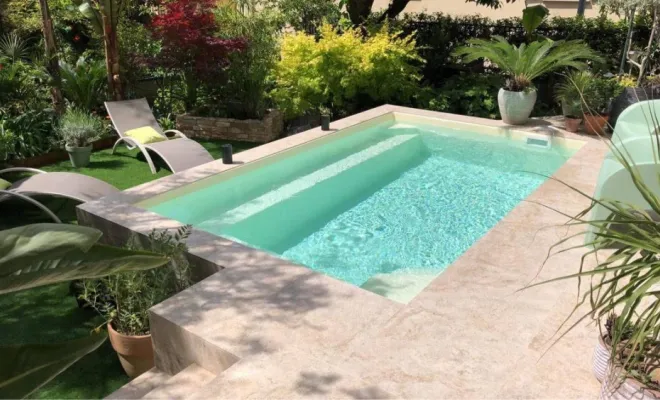 Photo d'une piscine atlantis 4 avec sa terrasse carrelé